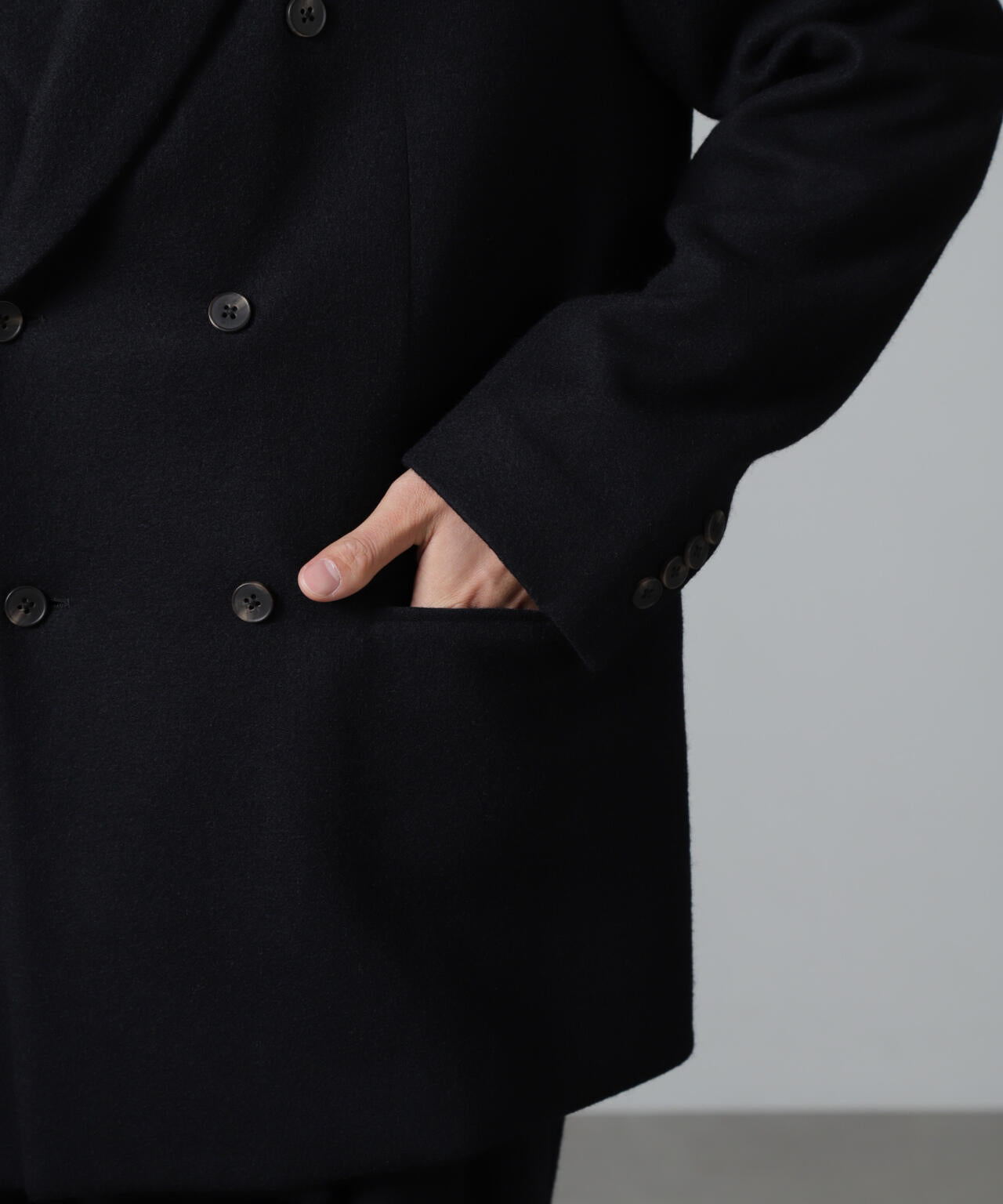 「100%ウール」ピークドラペルダブルジャケット