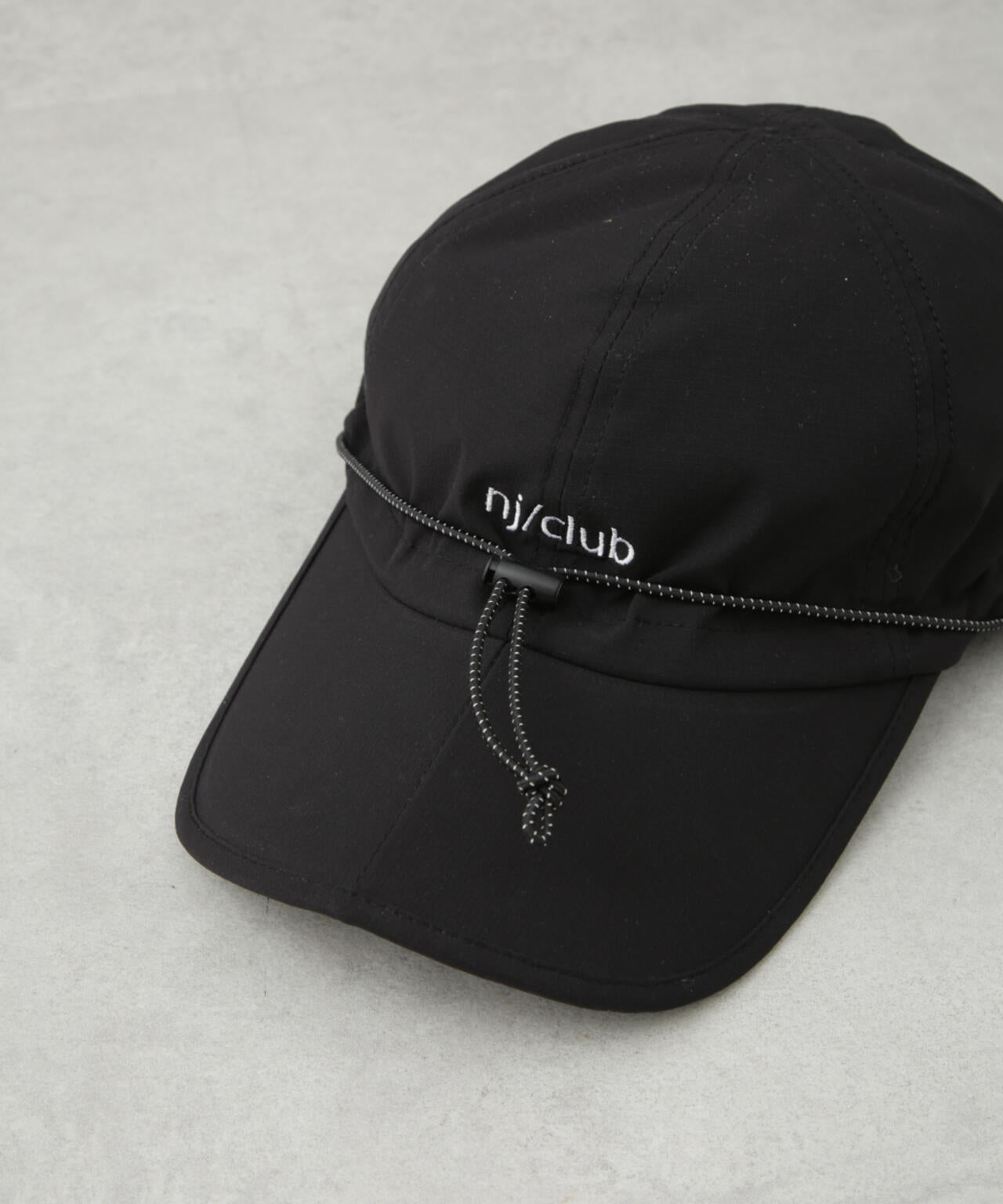 「NJ/CLUB」 エアーパッカブル キャップ