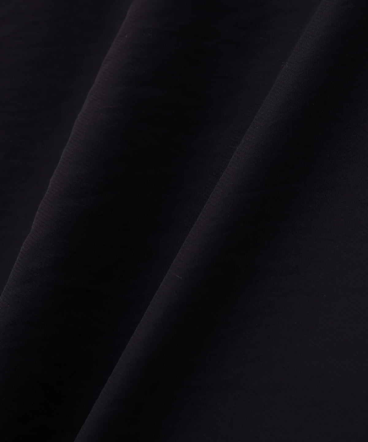ショルダースリットラッフルブラウス