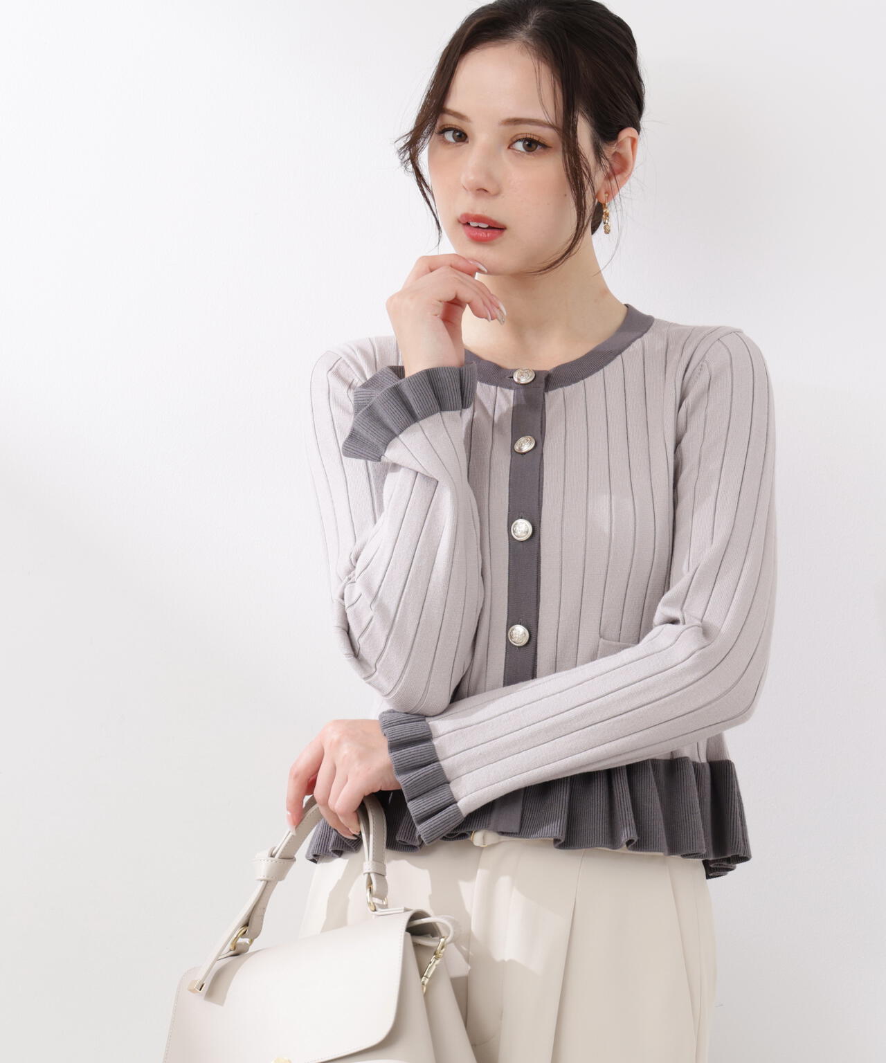 ＜ウォッシャブル/UV＞ボタン付きペプラムニット【ラベンダー：official site・一部店舗限定】