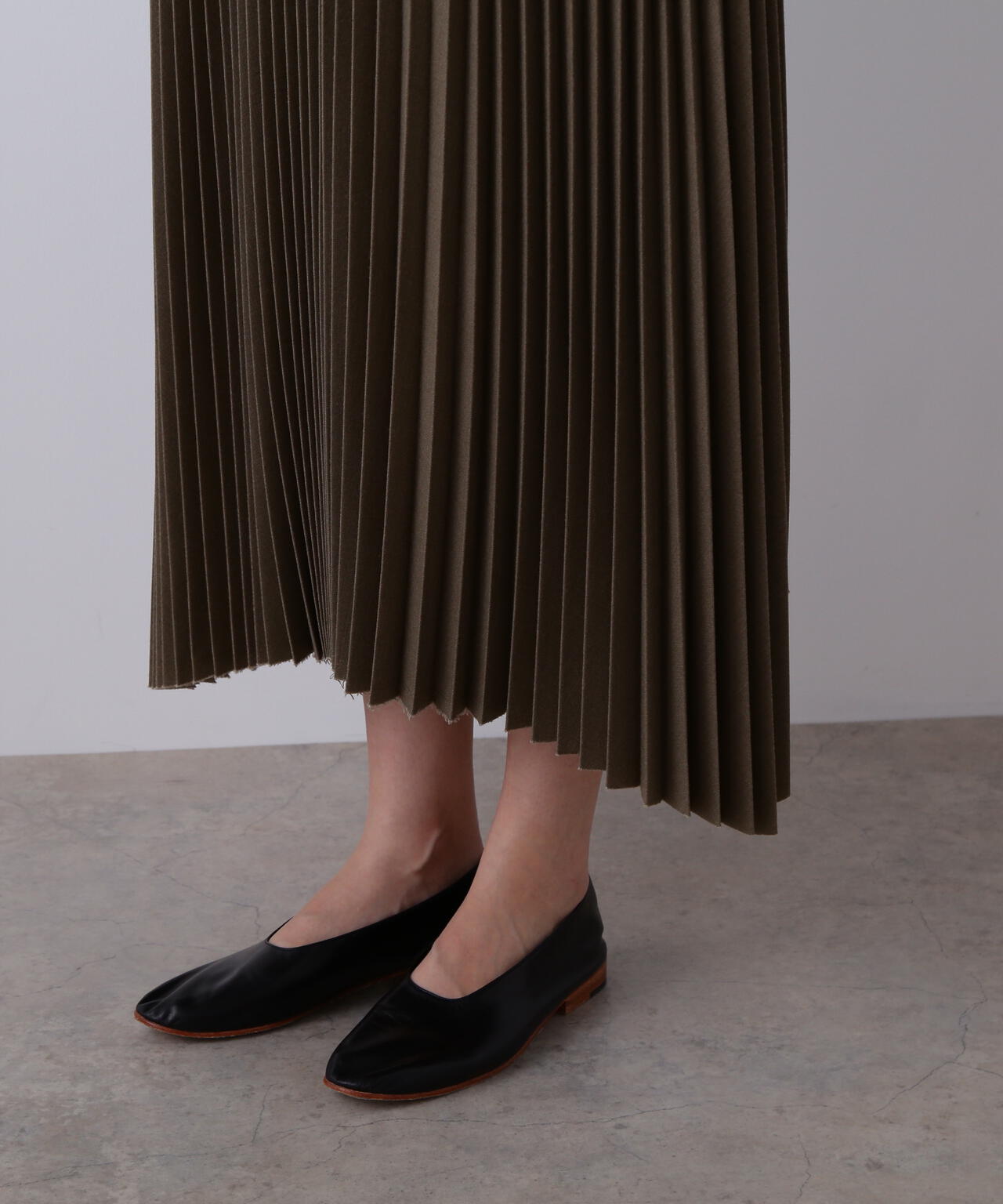 YLEVE / VINTAGE PIGMENTDYE WOOL PLEATED SKIRT