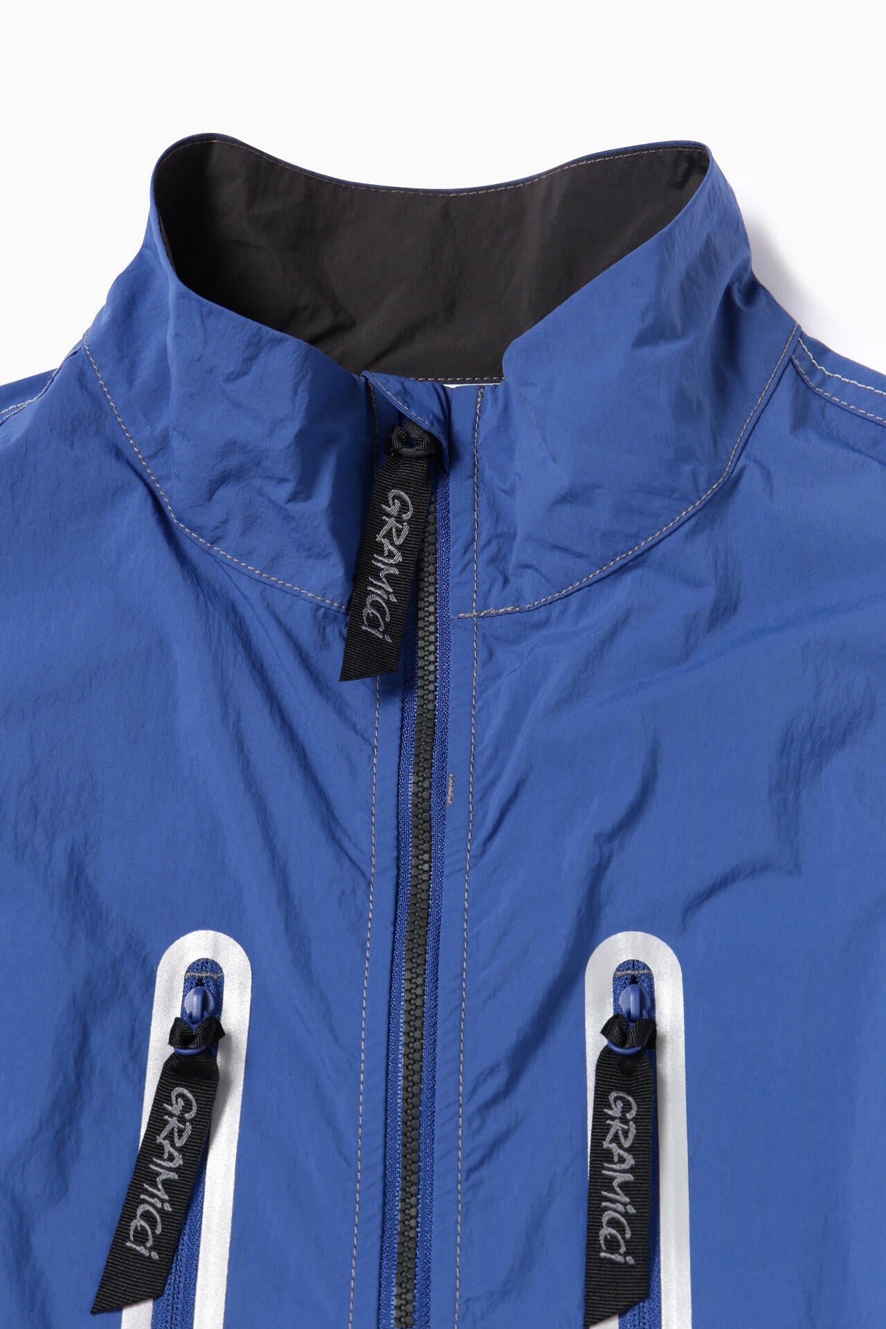 GRAMICCI × and wander brushed nylon vest