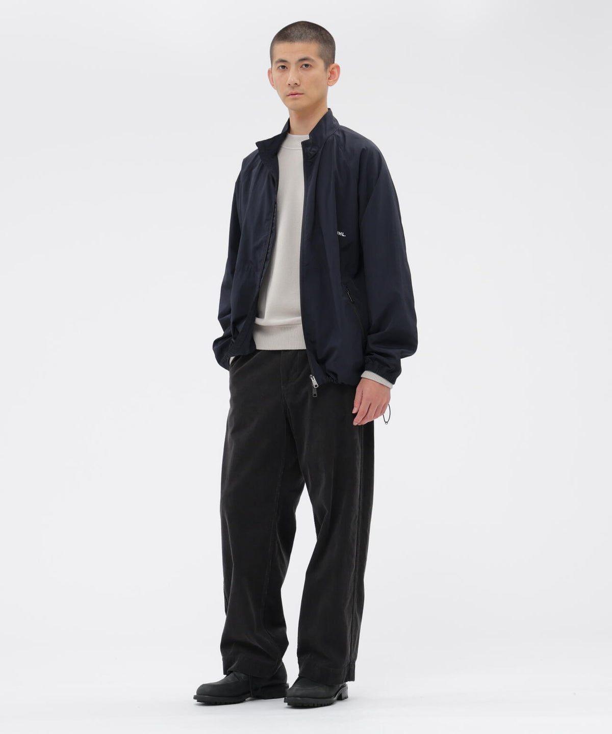 FELTED ROUGH WOOL KNITWEAR