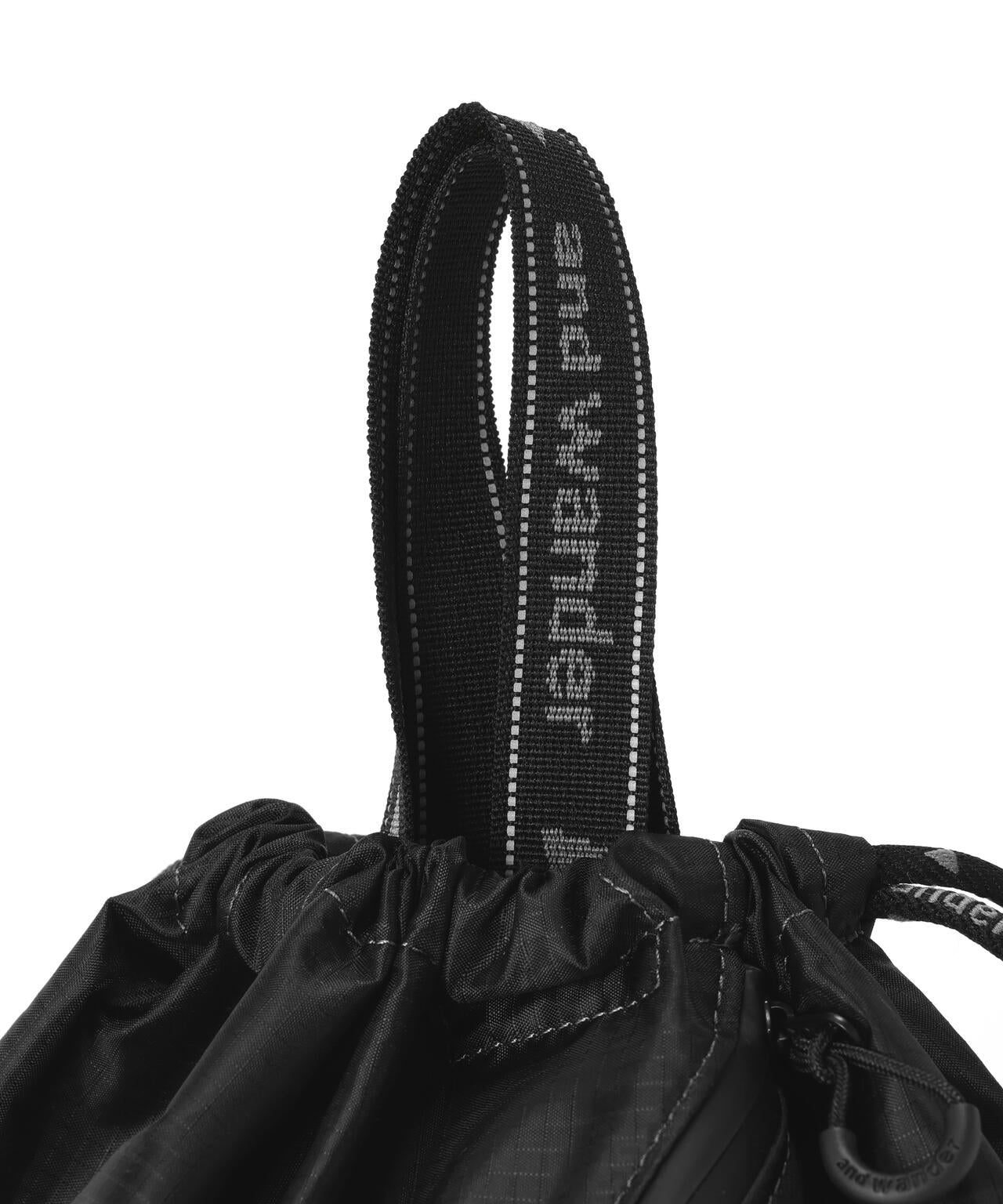 and wander/アンドワンダー　crispy rip drawstrung bag　ナップサック