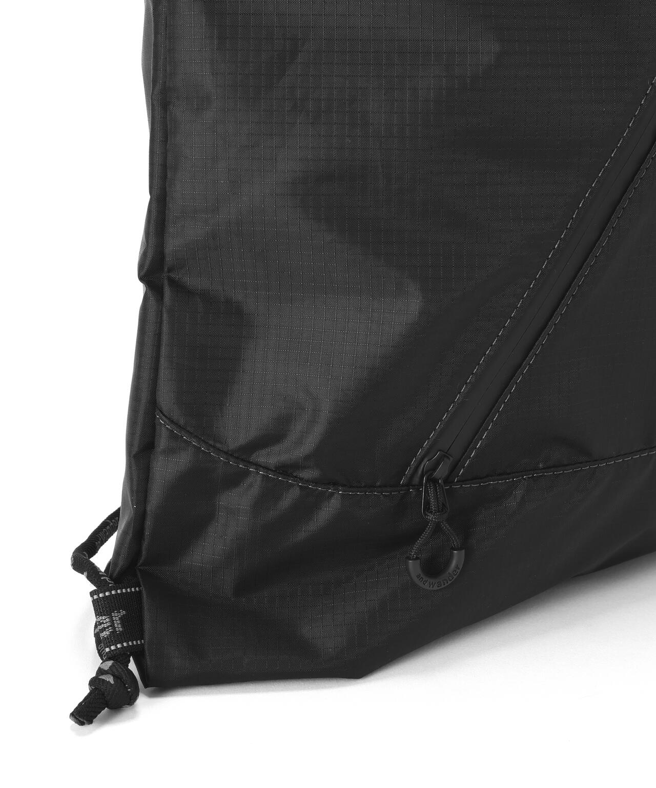 and wander/アンドワンダー　crispy rip drawstrung bag　ナップサック